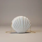 Sac chaine soirée forme coquillage pailleté